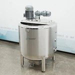 Wall scraping mixing emulsion tank